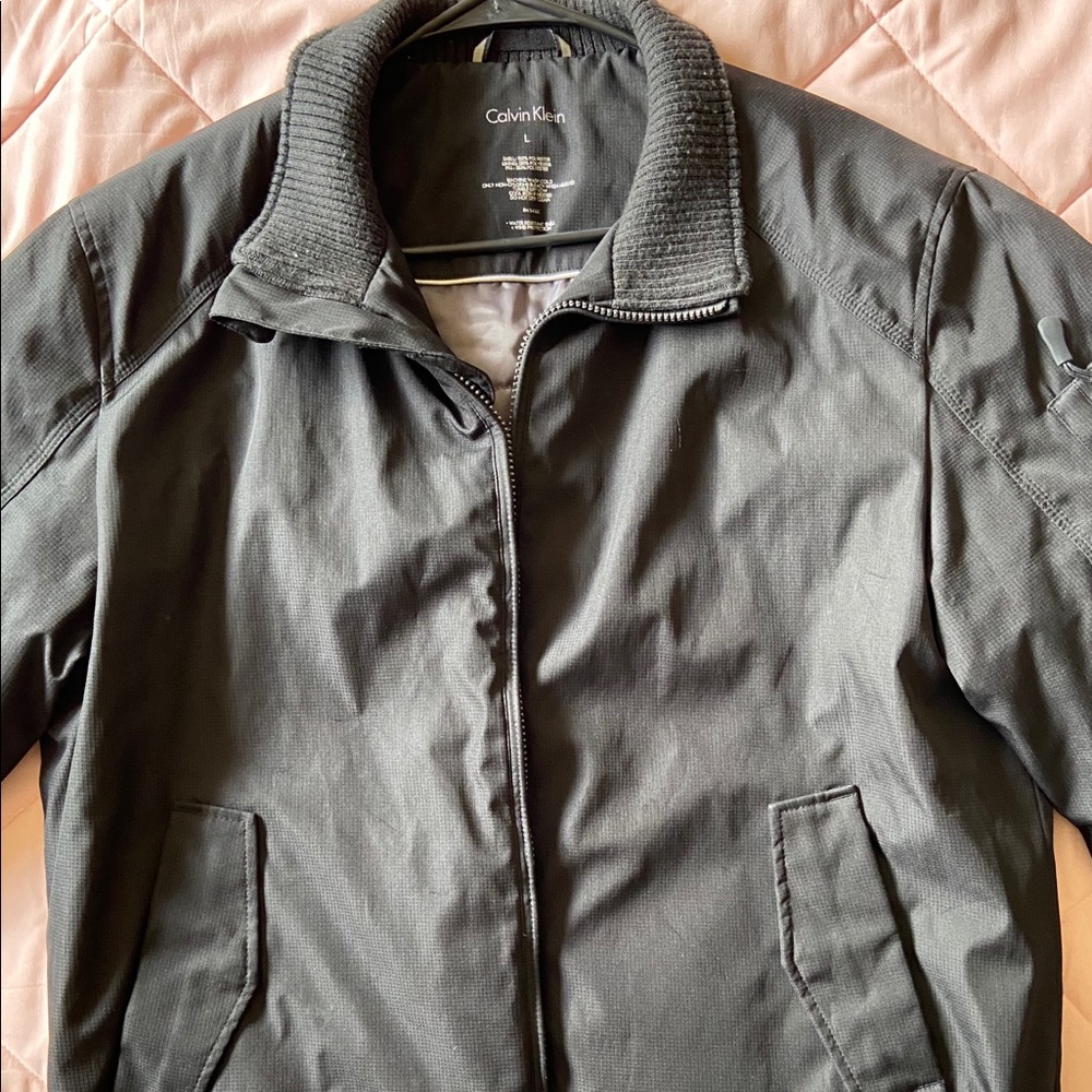 Black Calvin Klein bomber jacket